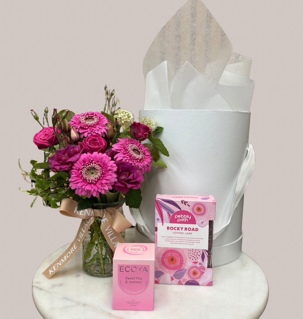 Bouquet of pink flowers with a box of Rocky Road chocolates and Ecoya soap. Hamper for Birthdays, Celebrations and Anniversaries. Brisbane hamper delivery.
