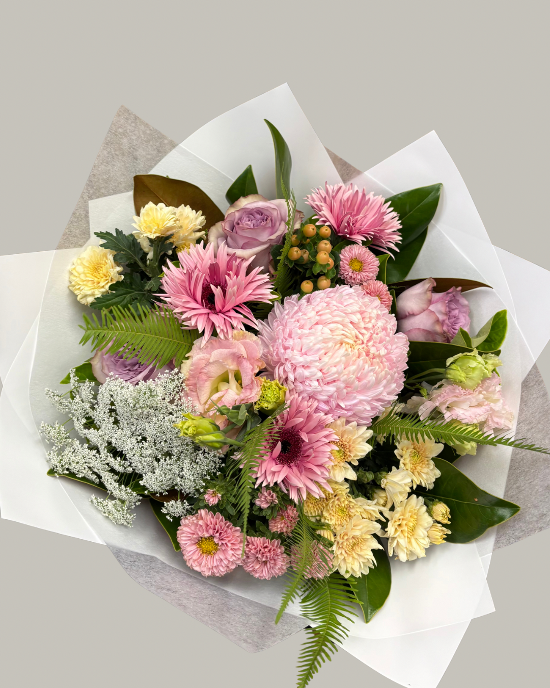 Posie bouquet. Pinks and pastels. No vase. Signature size posie. Flower delivery 