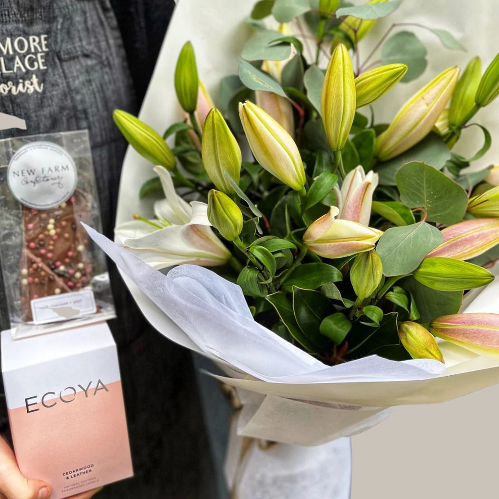 Lily bouquet, Ecoya Candle and New farm Chocolate gift set. Kenmore Village Florist. Brisbane Flower Delivery. Same Day Delivery available.