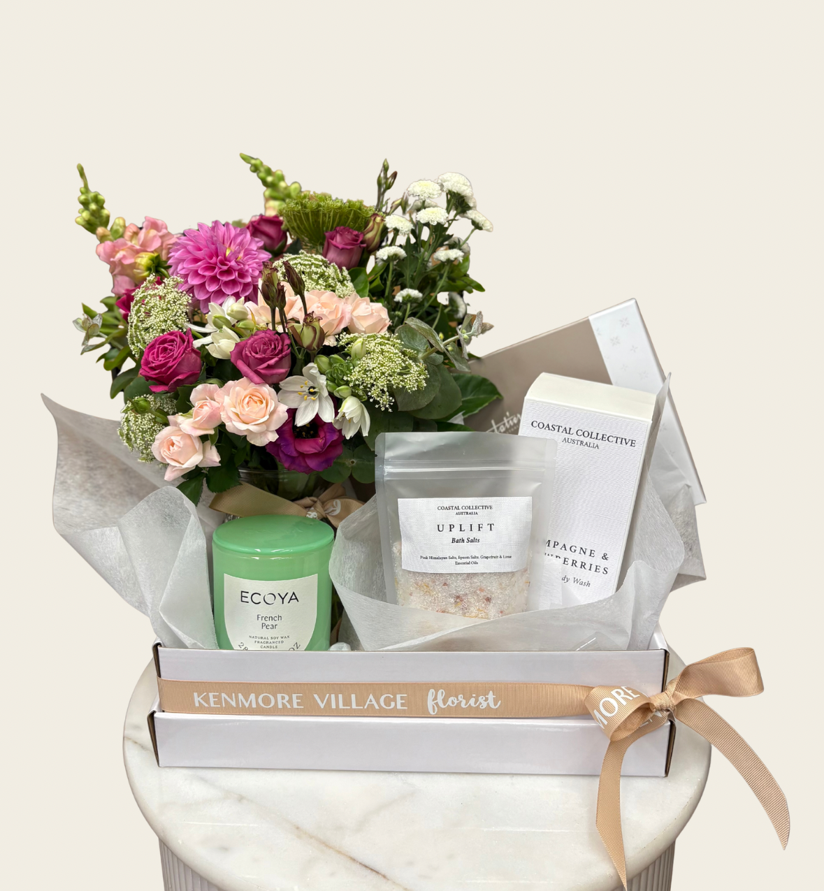 Gift box with flowers, candles, chocolates and bath products. Brisbane hamper delivery. Kenmore Village Florist. Same Day delivery available.