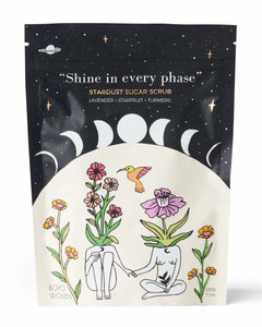 Stardust sugar scrub packaging with celestial design and illustrations of people and plants.